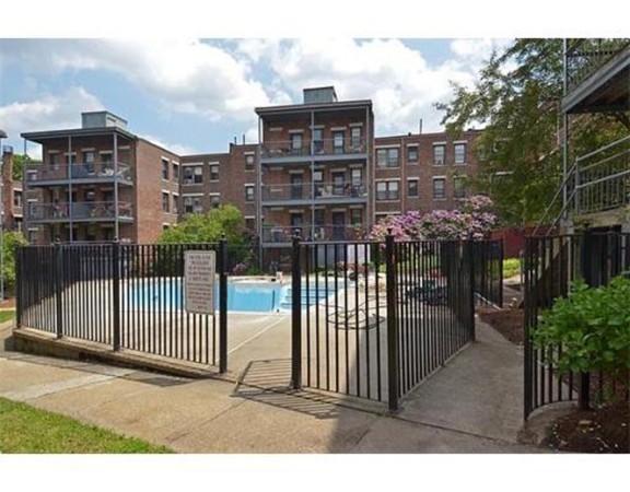30 Kinross Road, Unit 12 Boston, MA 02135 - Photo 10 of 11 a view of a balcony with a iron fence