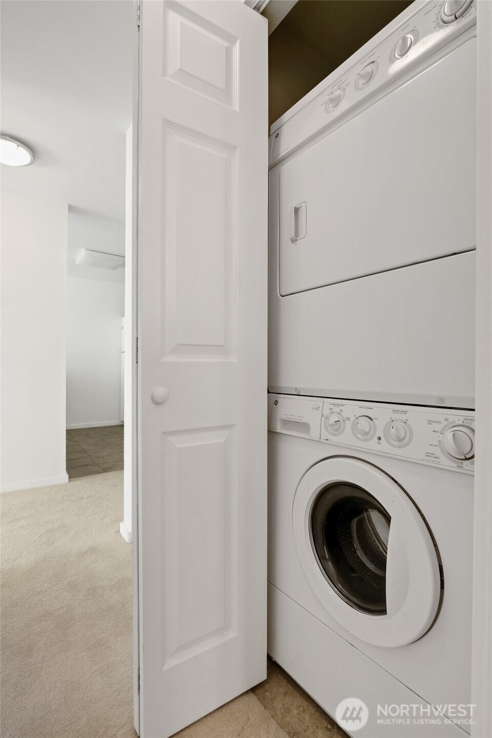 10501 8th Avenue Northeast, Unit 334 Seattle, WA 98125 - Photo 15 of 22 a close up view of a washer and dryer