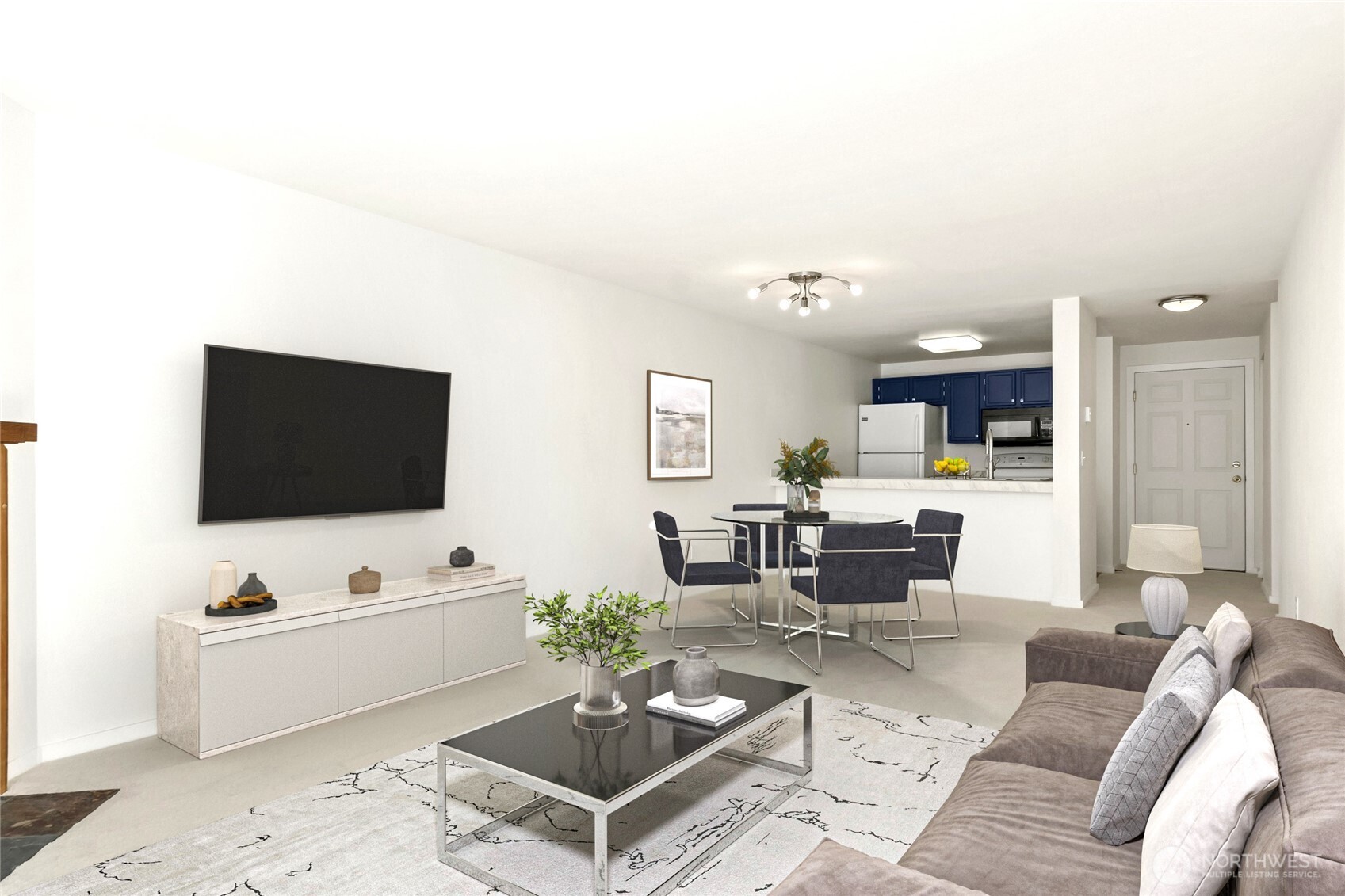 10501 8th Avenue Northeast, Unit 334 Seattle, WA 98125 - Photo 3 of 22 a living room with furniture and a flat screen tv
