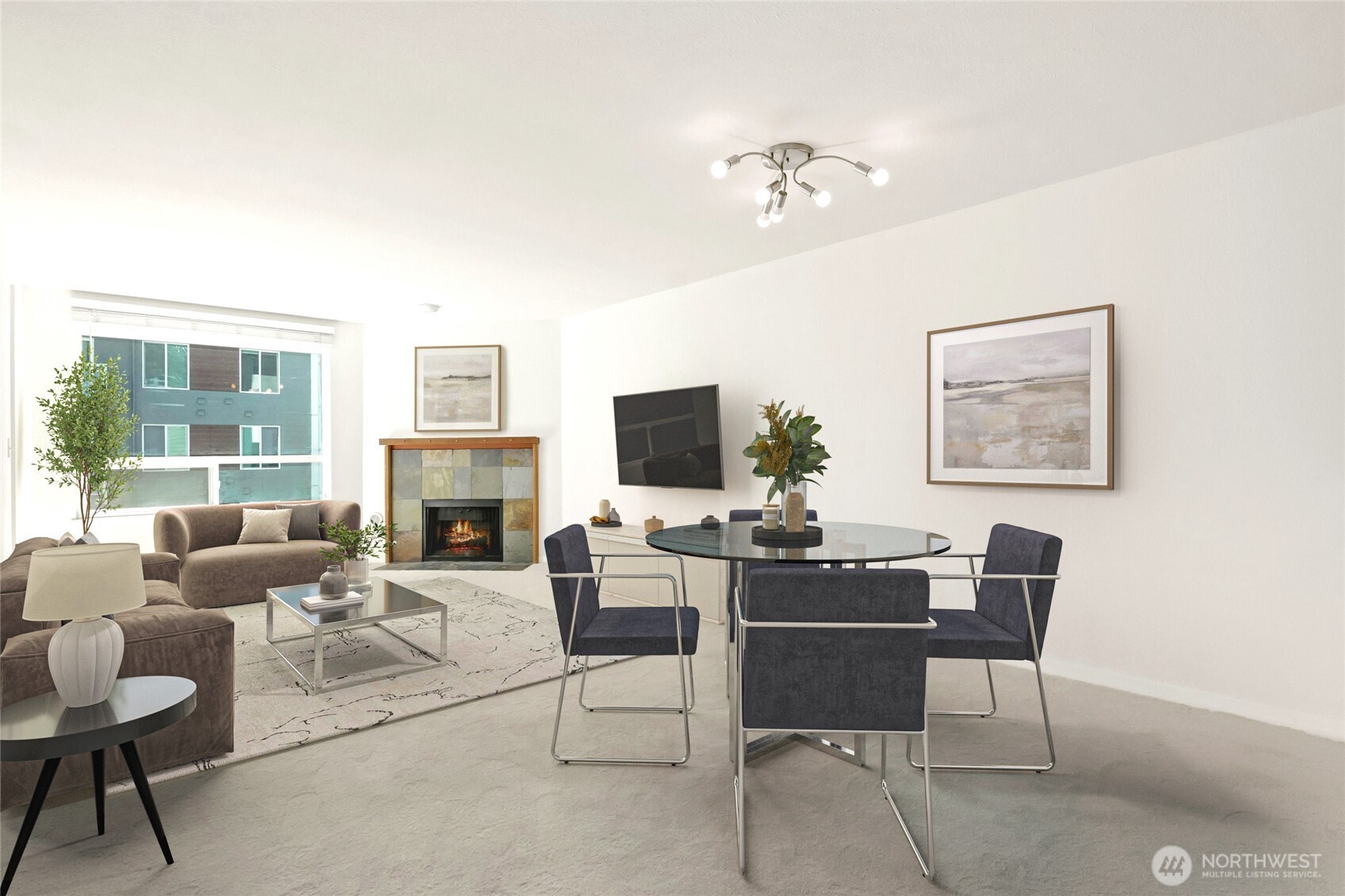 10501 8th Avenue Northeast, Unit 334 Seattle, WA 98125 - Photo 5 of 22 a living room with furniture a fireplace and a flat screen tv