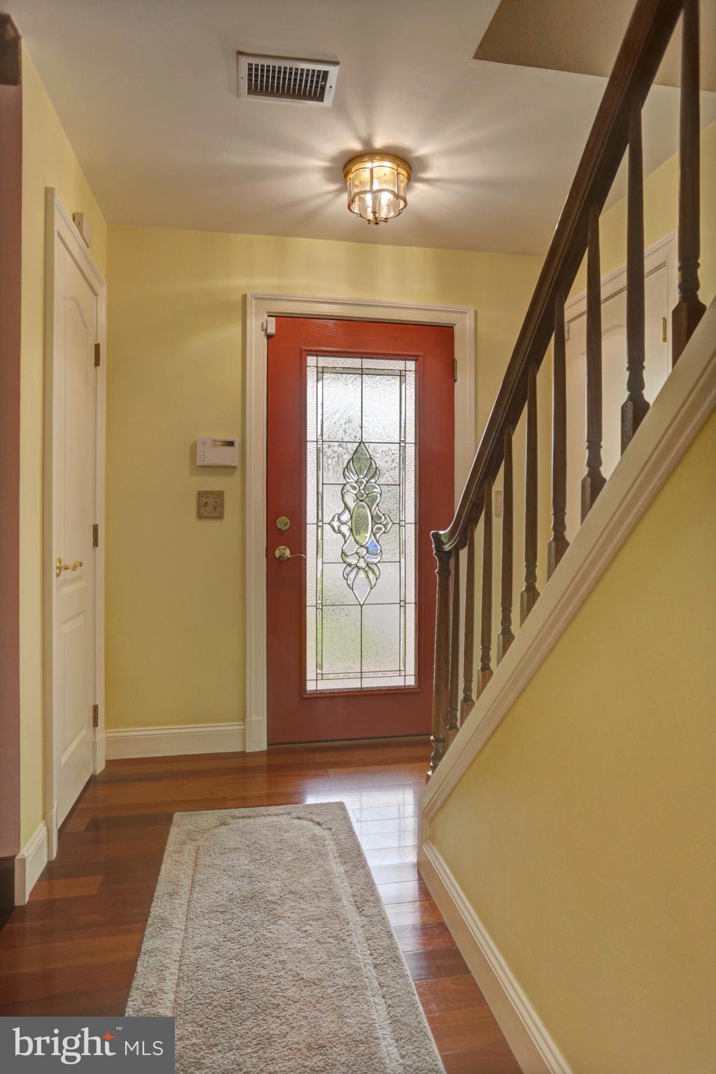 5135 Arney Road Harrisburg, PA 17111 - Photo 4 of 38 Greet guests in the entryway with hardwood floors.
