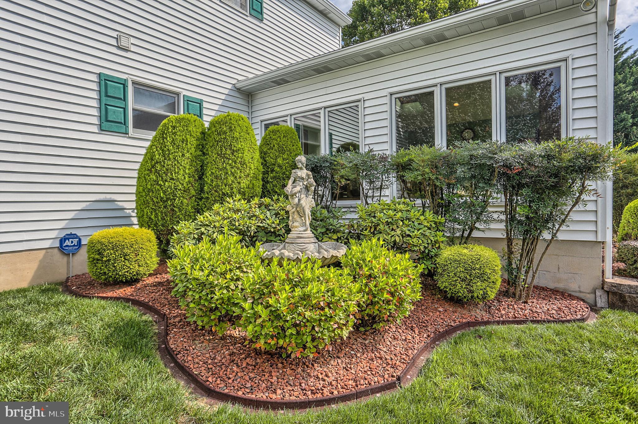5135 Arney Road Harrisburg, PA 17111 - Photo 32 of 38 Manicured lawn with ornamental shrubs