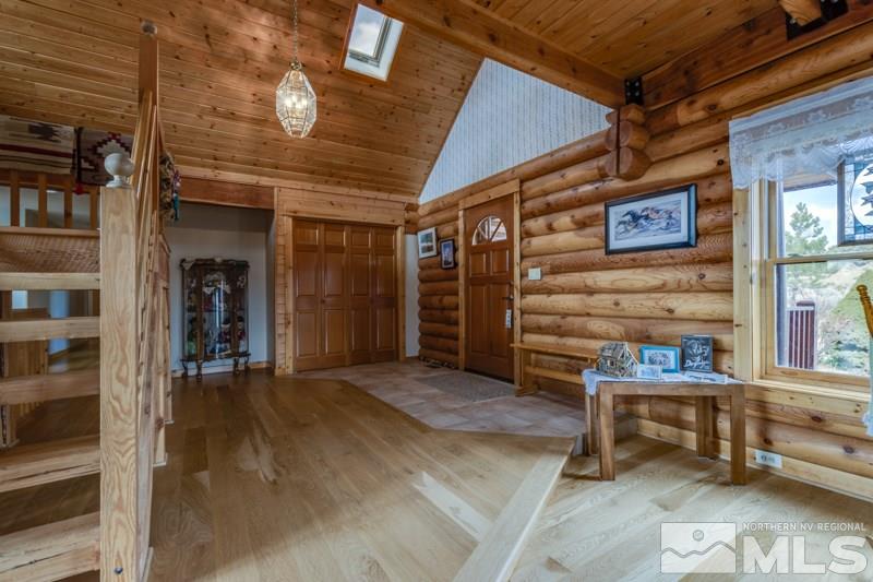 650 Curnow Canyon Road Reno, NV 89510 - Photo 14 of 40 a view of a building with door and wooden walls