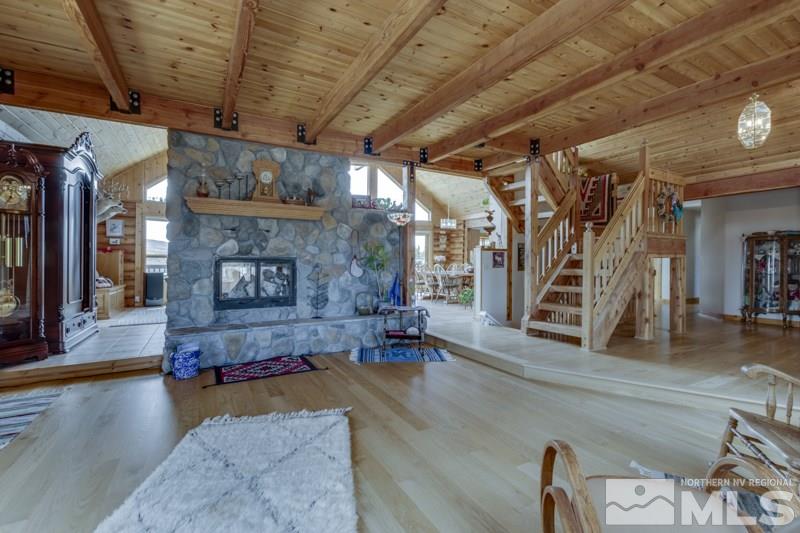 650 Curnow Canyon Road Reno, NV 89510 - Photo 20 of 40 a living room with furniture and a fireplace