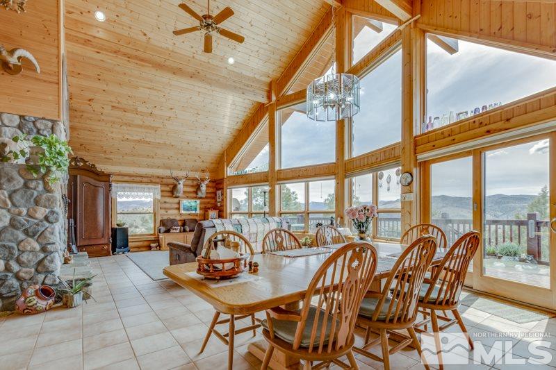 650 Curnow Canyon Road Reno, NV 89510 - Photo 21 of 40 a view of a dining room with furniture window and outside view