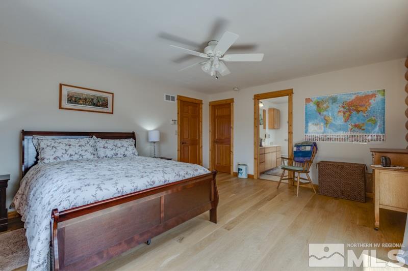 650 Curnow Canyon Road Reno, NV 89510 - Photo 30 of 40 a bedroom with a bed and furniture