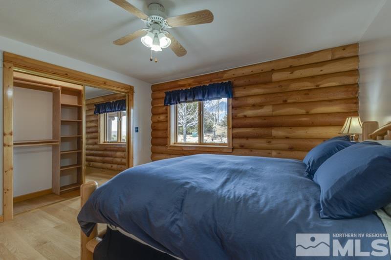 650 Curnow Canyon Road Reno, NV 89510 - Photo 31 of 40 a bed sitting in a room next to a window