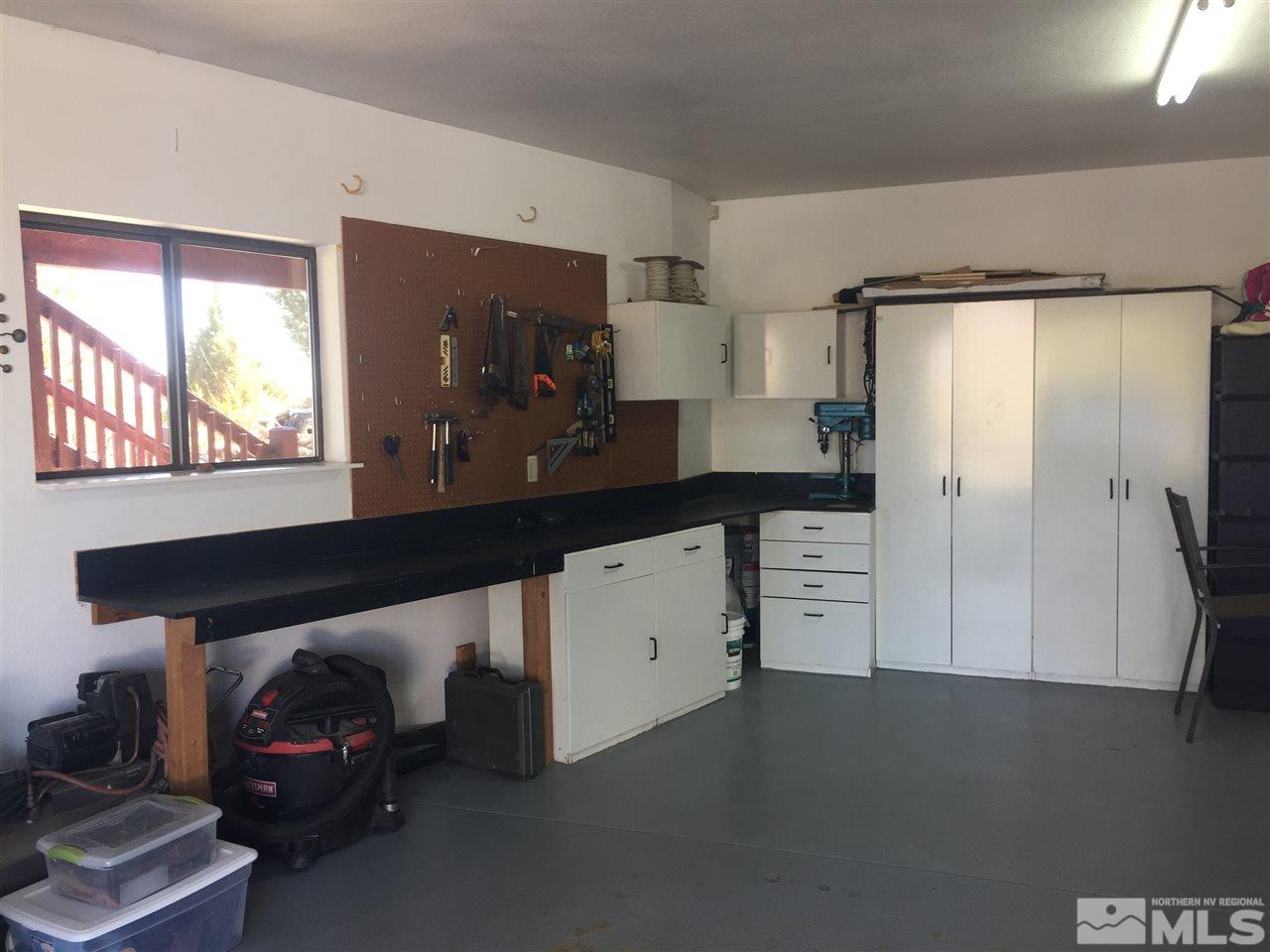 650 Curnow Canyon Road Reno, NV 89510 - Photo 8 of 40 a kitchen with a refrigerator and a window