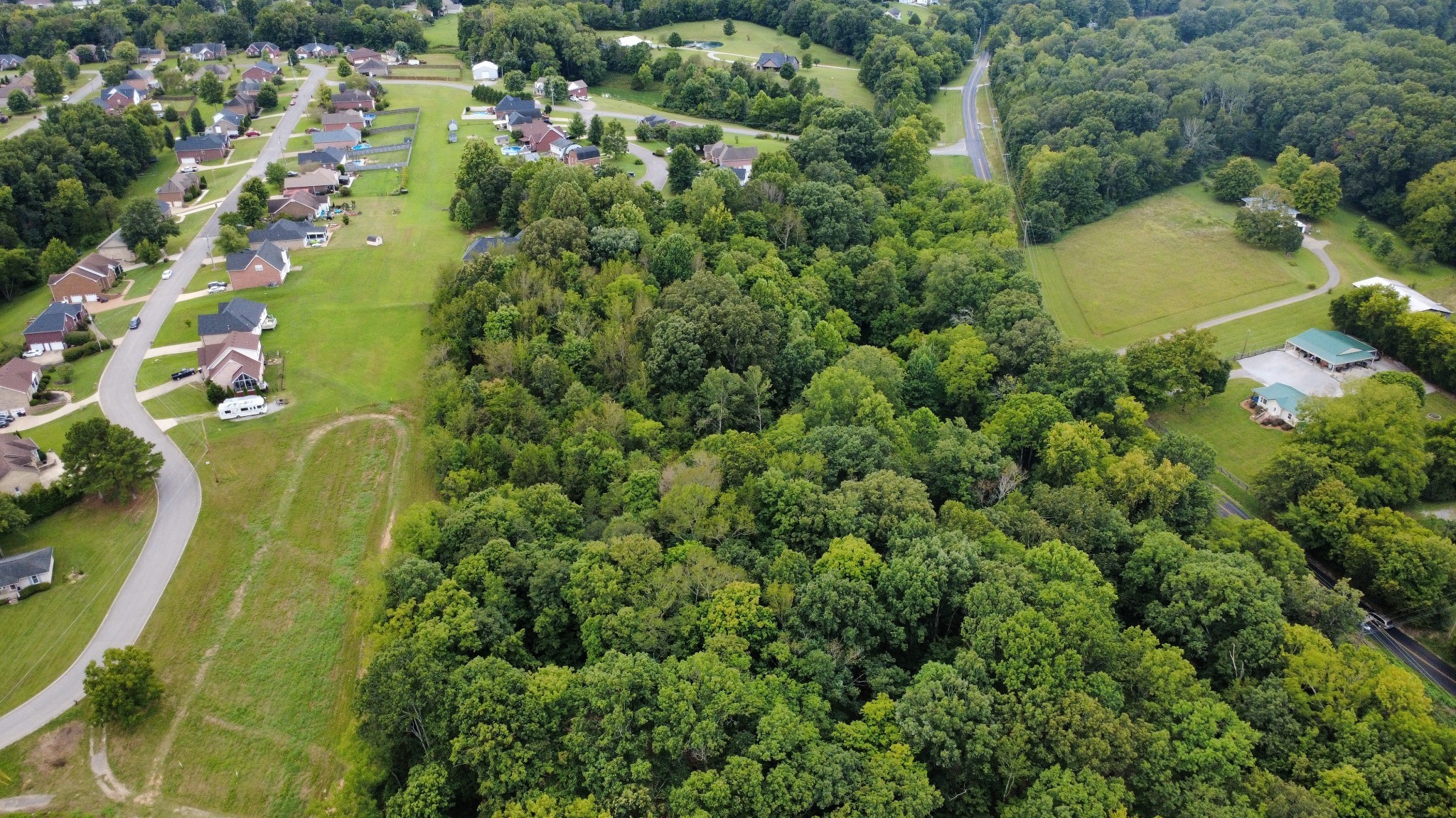 6481 Kelly Willis Road Greenbrier, TN 37073 - Photo 11 of 13 an aerial view of a residential houses with outdoor space and street view