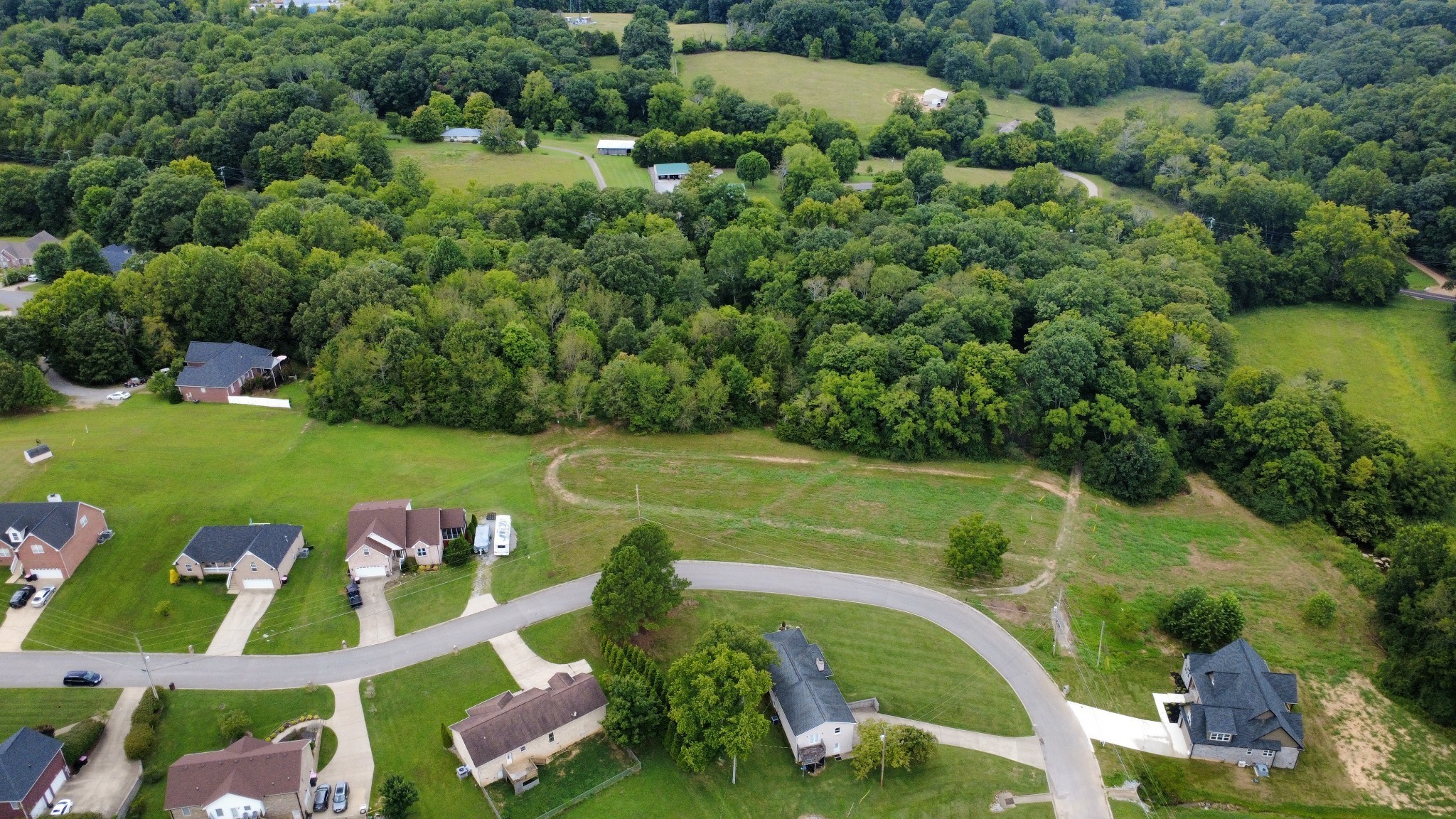 6481 Kelly Willis Road Greenbrier, TN 37073 - Photo 12 of 13 an aerial view of a golf course with chairs