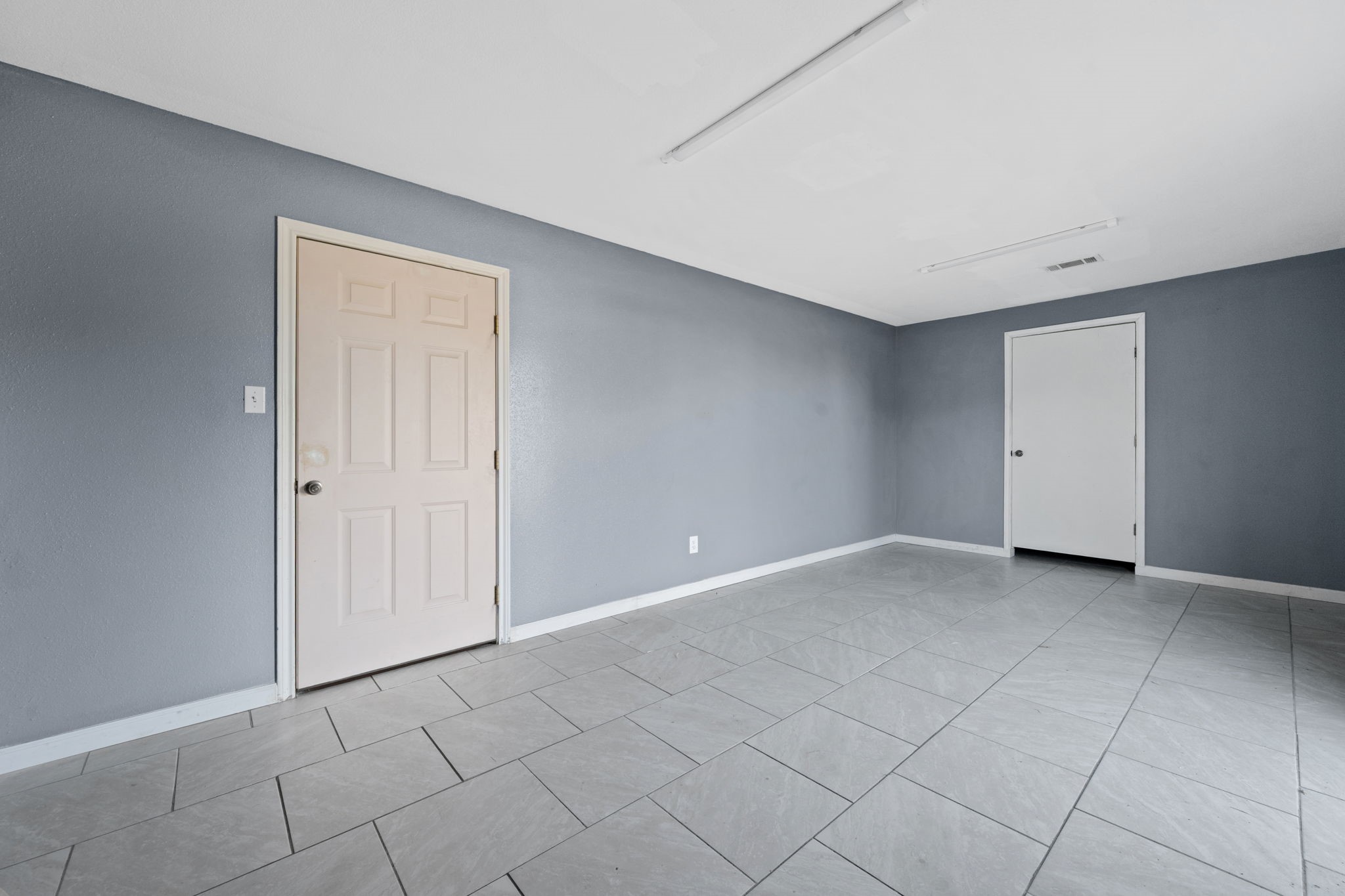 114 Main Street Hull, TX 77564 - Photo 16 of 25 a view of an empty room with a window