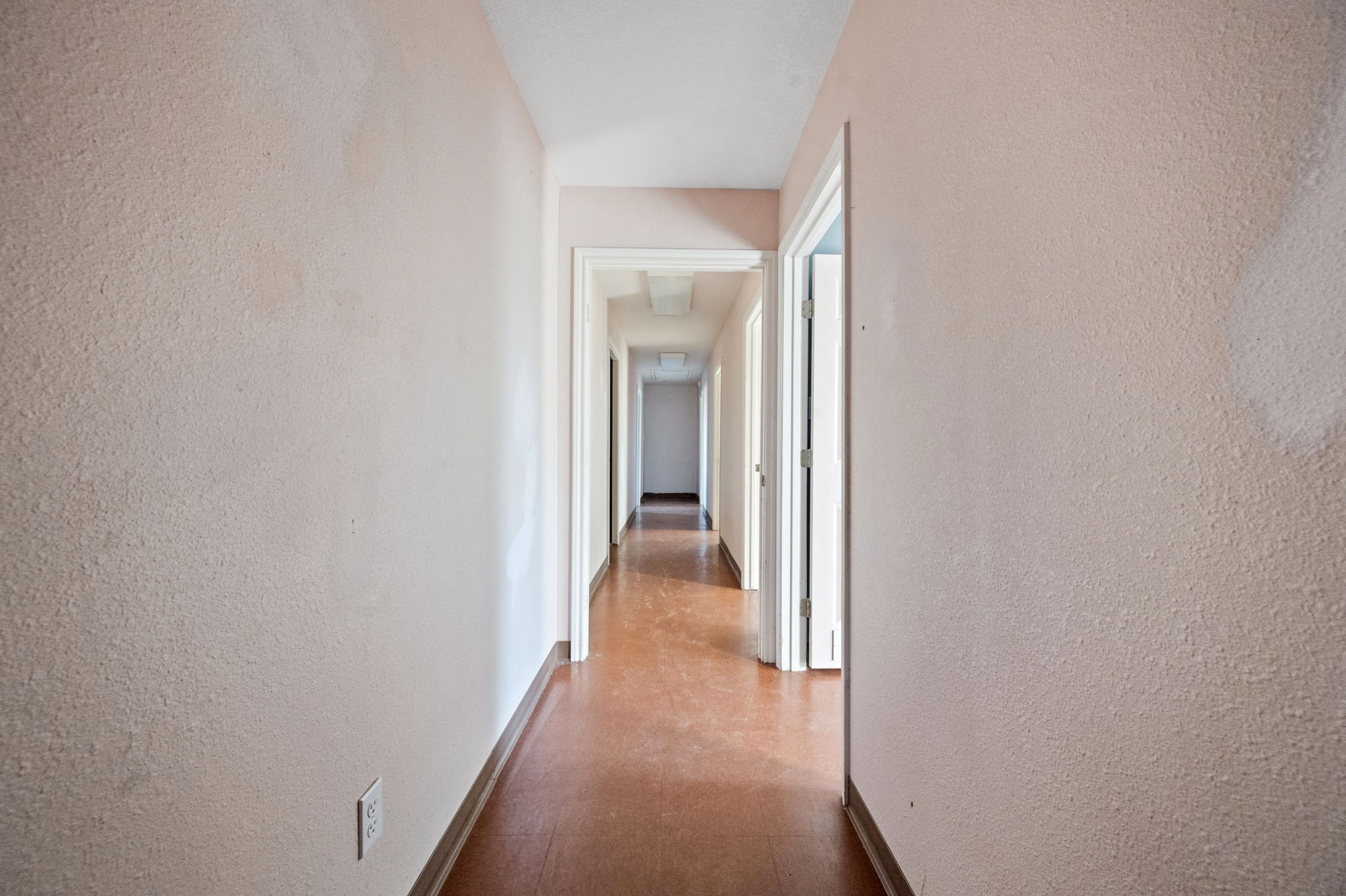 114 Main Street Hull, TX 77564 - Photo 19 of 25 a view of a livingroom from a hallway