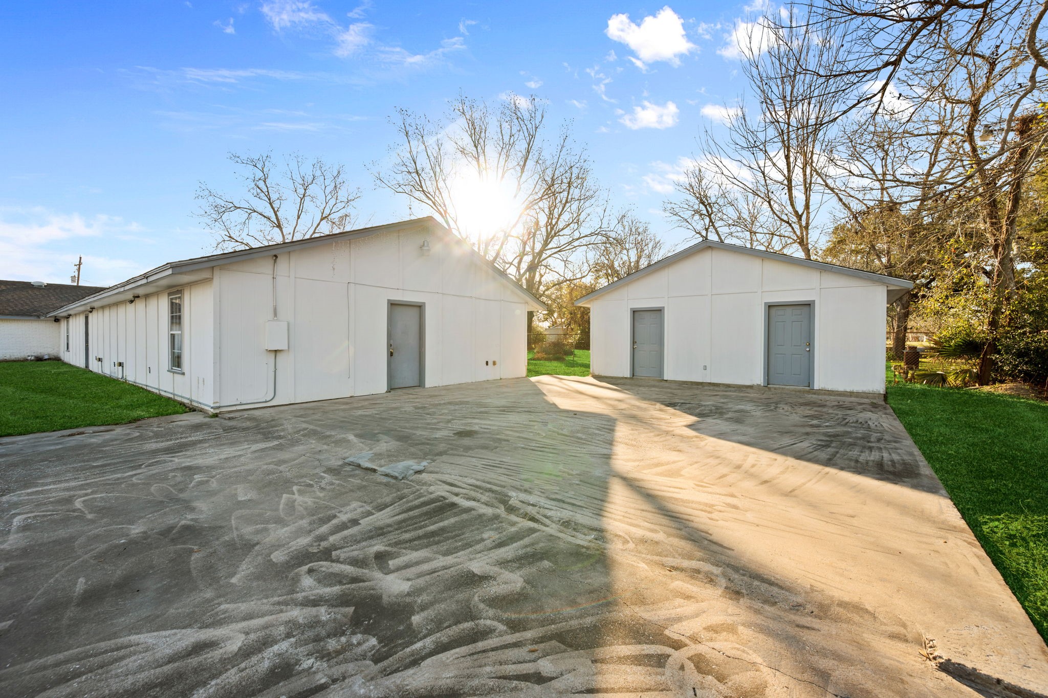 114 Main Street Hull, TX 77564 - Photo 2 of 25 a view of garage yard and tree