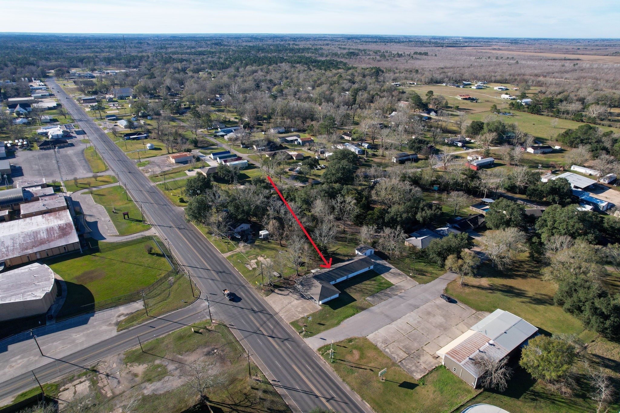 114 Main Street Hull, TX 77564 - Photo 21 of 25 an aerial view of a city