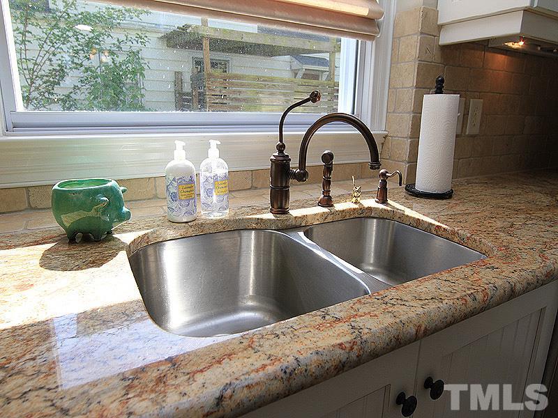 619 Mills Street Raleigh, NC 27608 - Photo 11 of 25 a close view of sink and tap