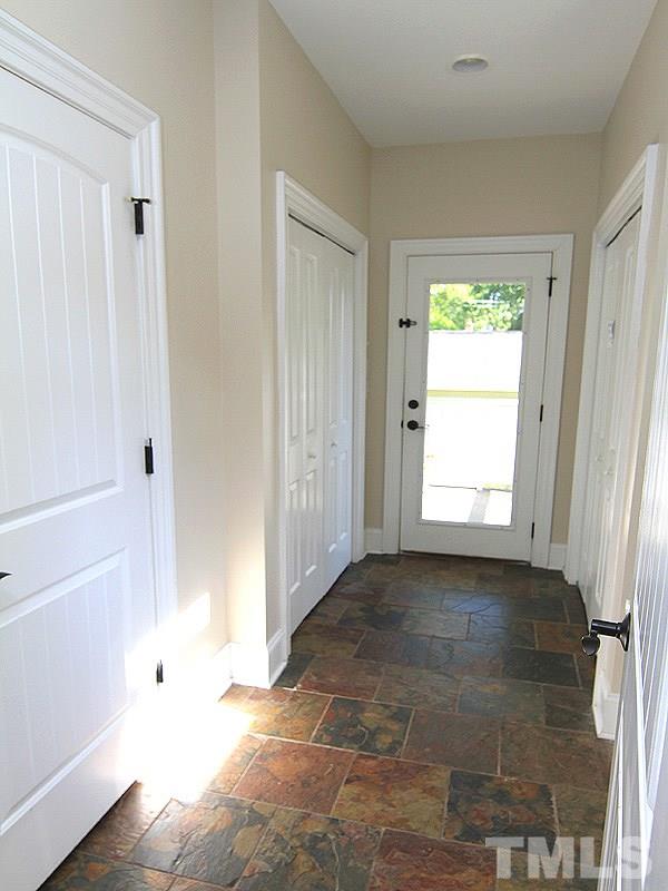 619 Mills Street Raleigh, NC 27608 - Photo 12 of 25 a view of an empty room with a window