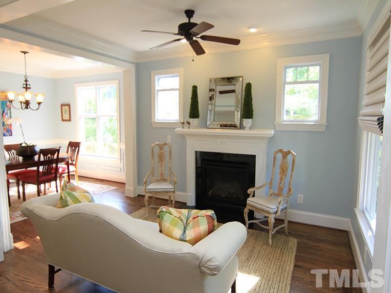 619 Mills Street Raleigh, NC 27608 - Photo 5 of 25 a living room with furniture fireplace and window