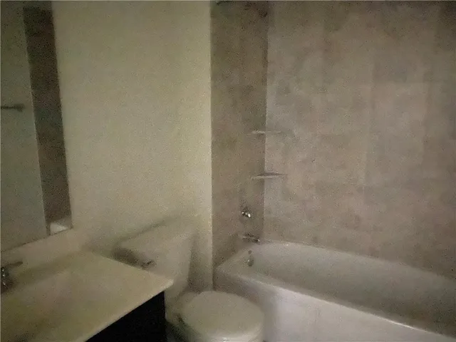 a bathroom with a sink and a bathtub