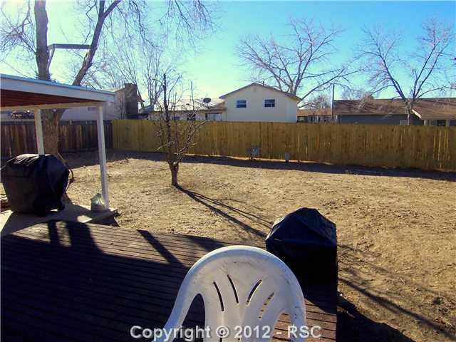 7212 River Bend Road Colorado Springs, CO 80911 - Photo 21 of 22 Large Deck Outside Dining Room