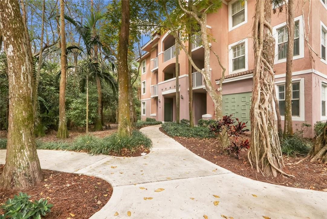 6882 West Sample Road, Unit 6882 Pompano Beach, FL 33063 - Photo 16 of 26 front view of a building