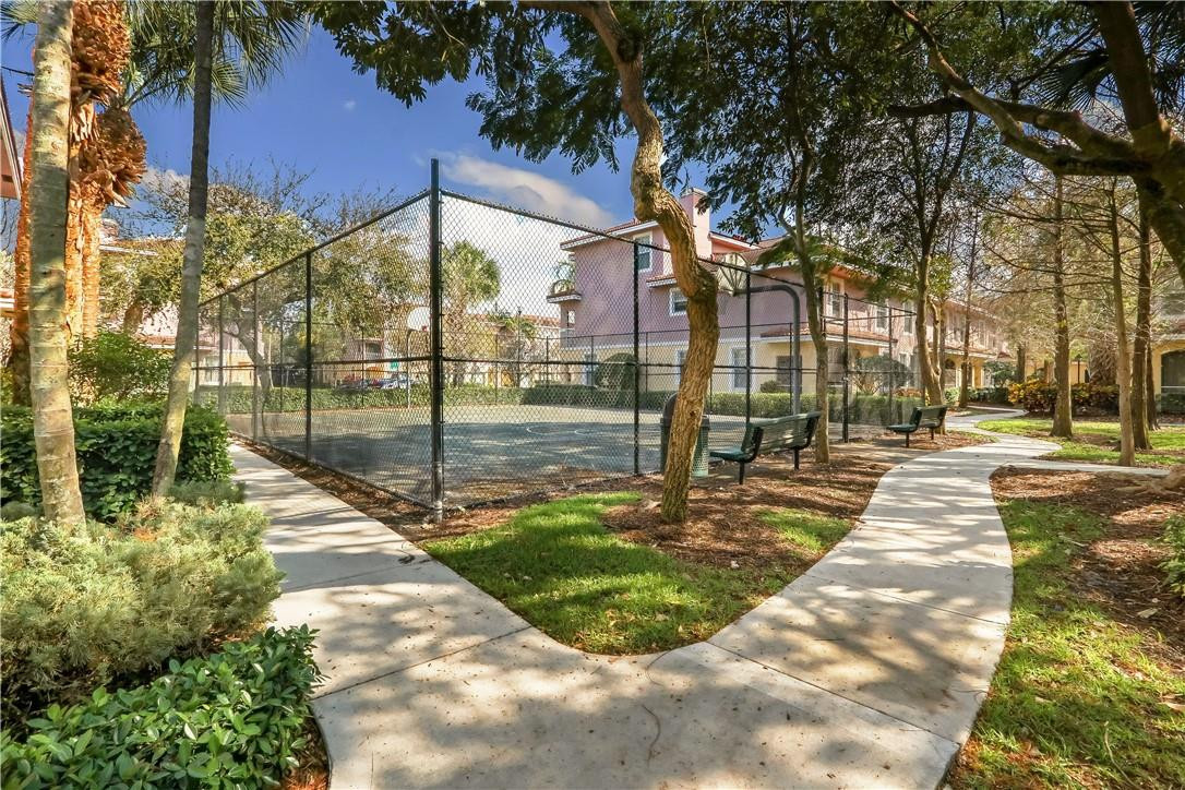 6882 West Sample Road, Unit 6882 Pompano Beach, FL 33063 - Photo 18 of 26 a view of swimming pool with a patio