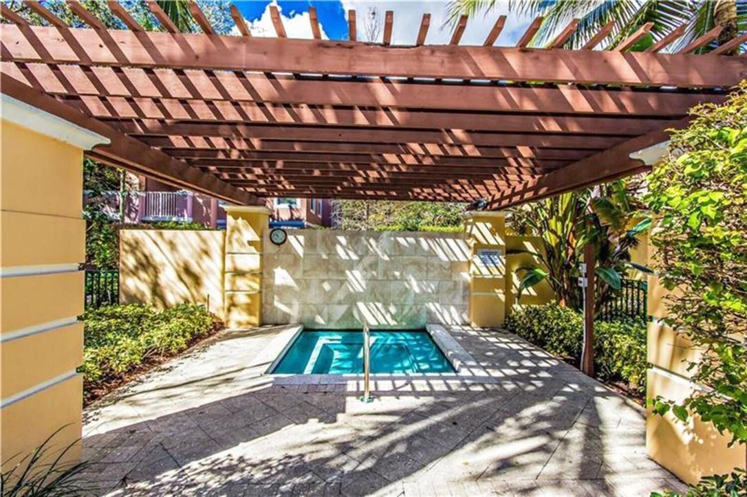 6882 West Sample Road, Unit 6882 Pompano Beach, FL 33063 - Photo 19 of 26 a view of an outdoor space