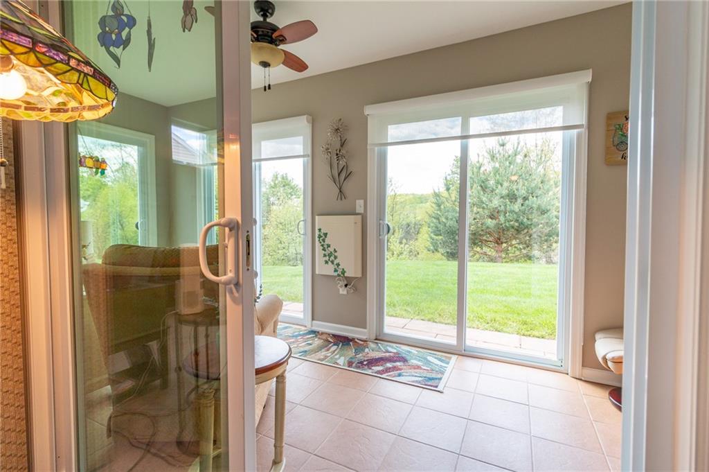 425 Chestnut Lane Apollo, PA 15613 - Photo 33 of 48 a living room with furniture and a floor to ceiling window