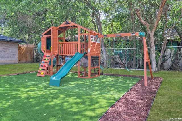 a view of a house with a park