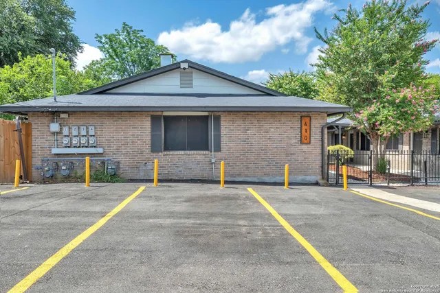 a front view of a house with garage