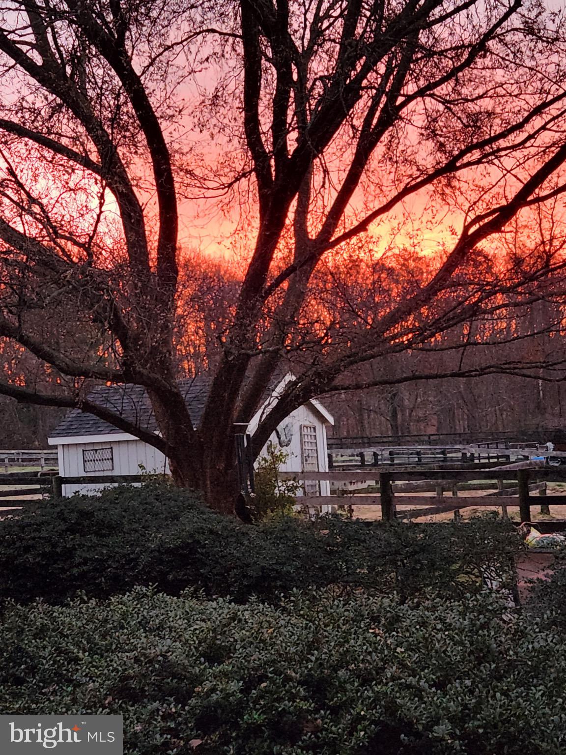 19255 Telegraph Springs Road Purcellville, VA 20132 - Photo 17 of 20 Sunset glow over a tranquil homestead.