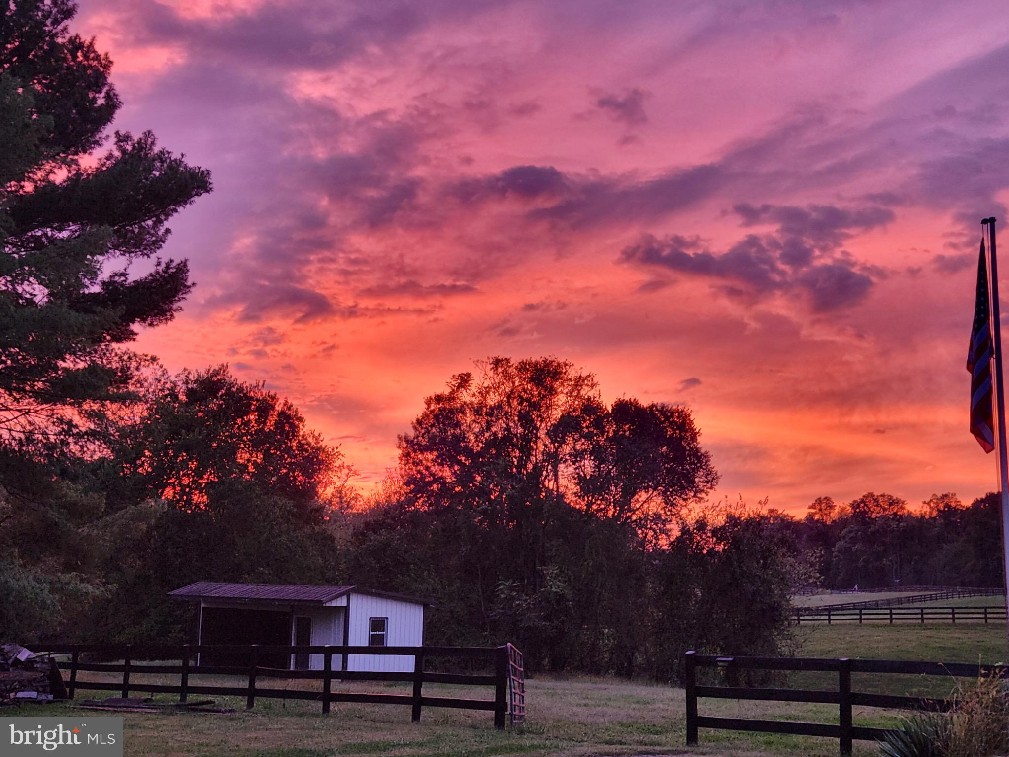 19255 Telegraph Springs Road Purcellville, VA 20132 - Photo 19 of 20 Vibrant sunset over tranquil countryside.