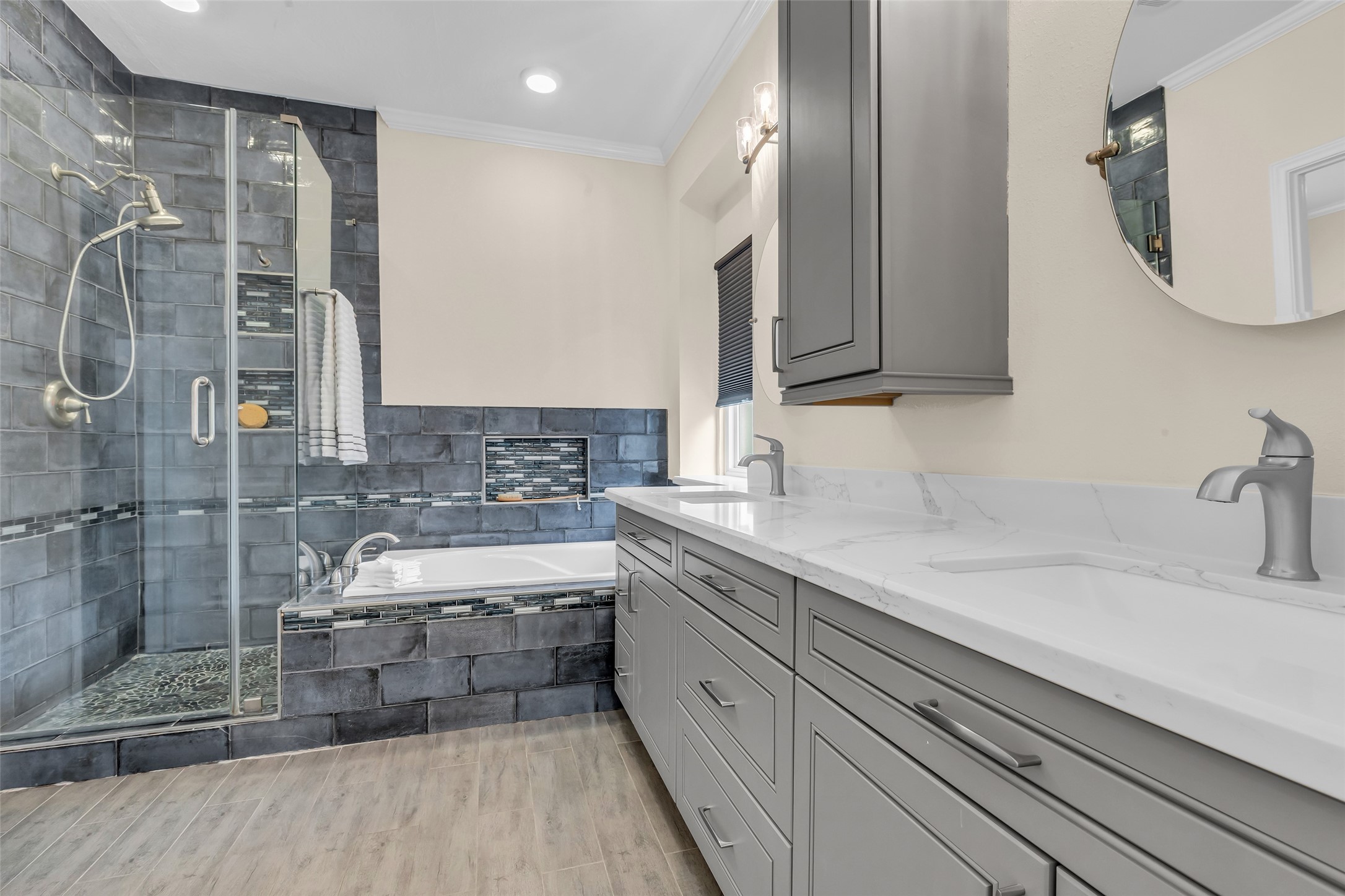 21618 Hannover Forest Spring, TX 77388 - Photo 18 of 32 Primary bath featuring dual sinks, a soaking tub, and separate stand up shower.