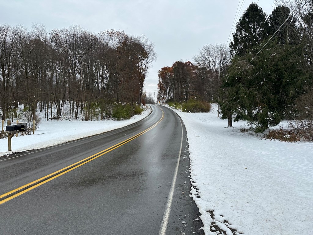 3776 Georgetown Road Polk, PA 16342 - Photo 12 of 26 a view of a road with a building in the background