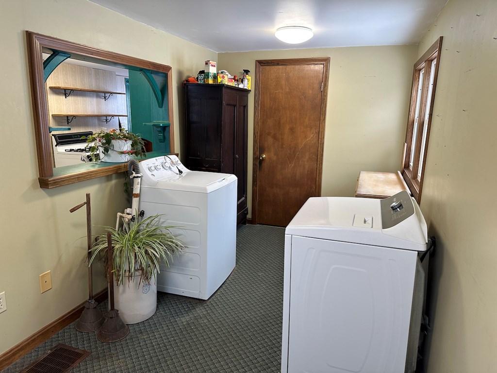 3776 Georgetown Road Polk, PA 16342 - Photo 13 of 26 a utility room with dryer and washer