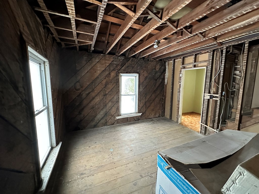 3776 Georgetown Road Polk, PA 16342 - Photo 25 of 26 a view of a hallway with furniture and a window