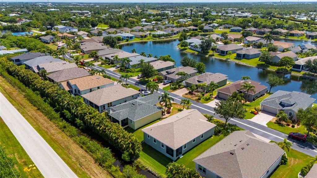 24604 Rio Villa Lakes Circle Punta Gorda, FL 33950 - Photo 17 of 28 an aerial view of a house with a lake view