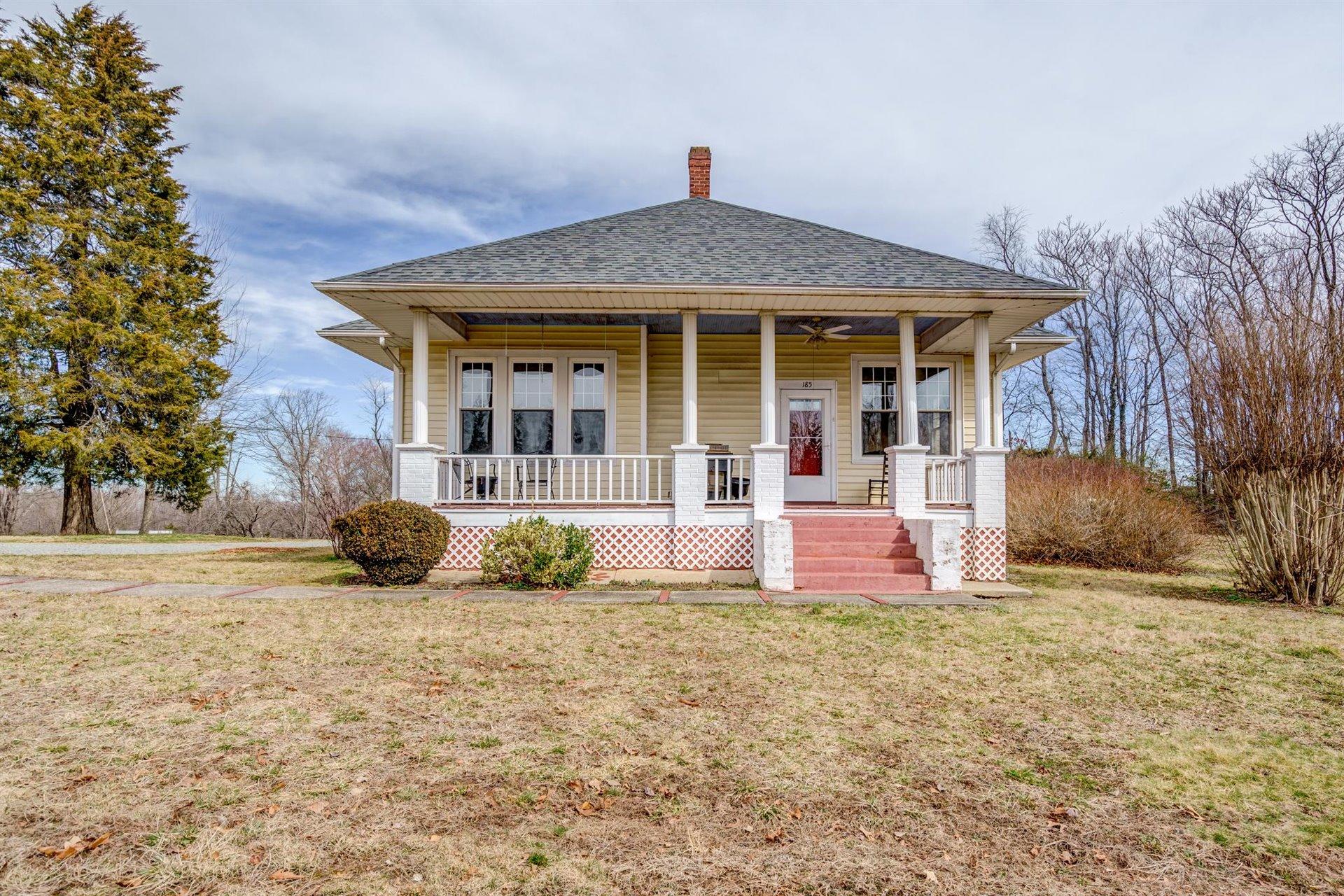 185 Tabernacle Road Penhook, VA 24137 - Photo 2 of 37 front view of a house with a yard
