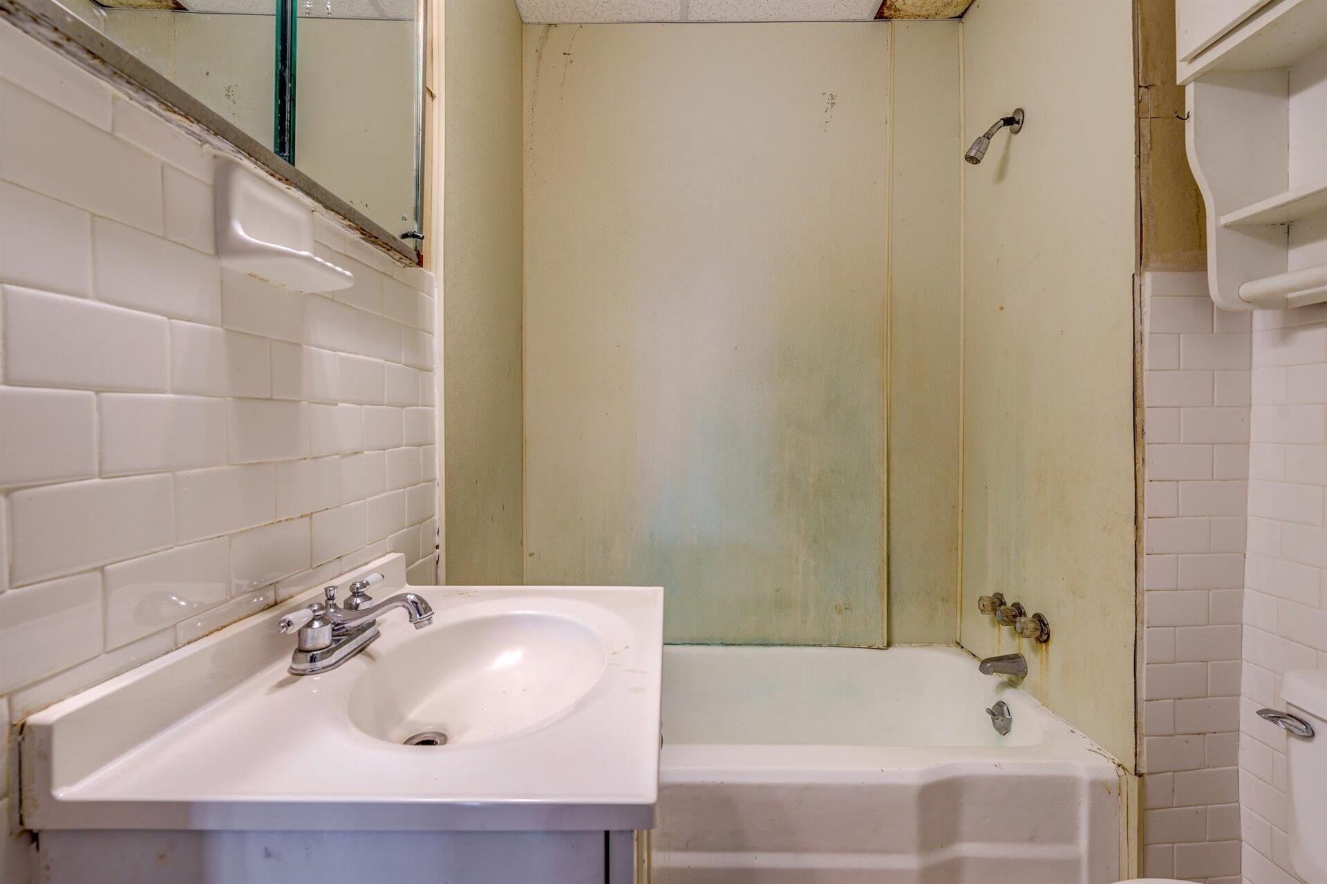 185 Tabernacle Road Penhook, VA 24137 - Photo 24 of 37 a bathroom with a sink and a bathtub
