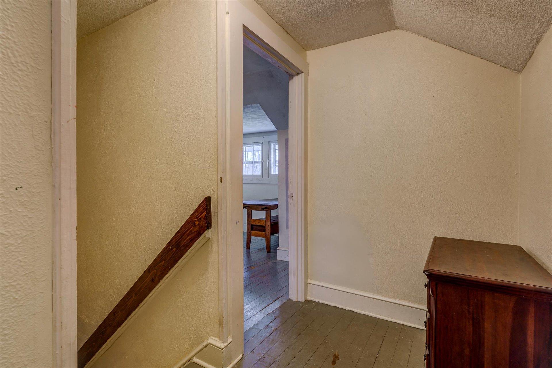 185 Tabernacle Road Penhook, VA 24137 - Photo 25 of 37 a view of hallway with wooden floor