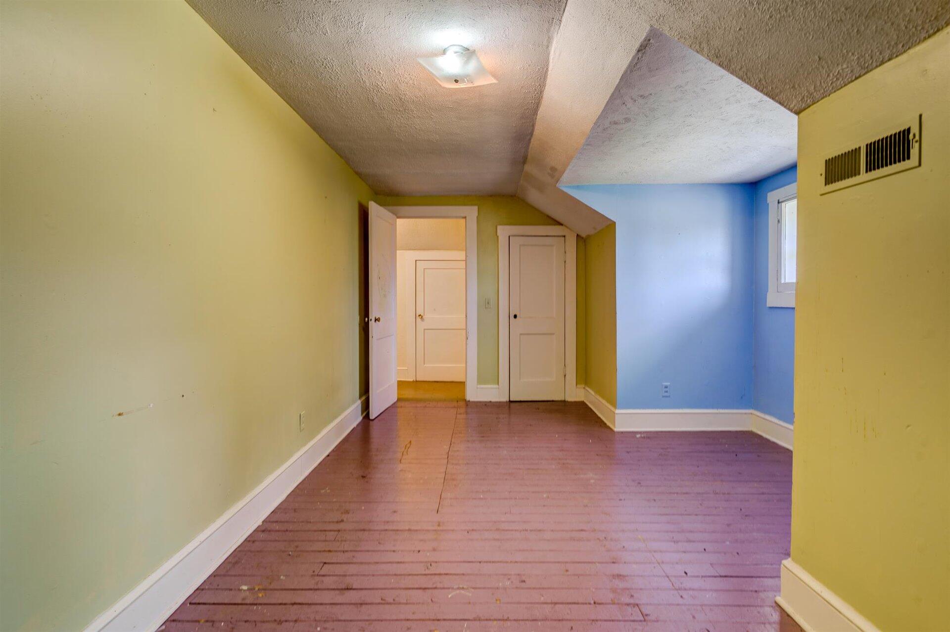 185 Tabernacle Road Penhook, VA 24137 - Photo 27 of 37 a view of an empty room with wooden floor
