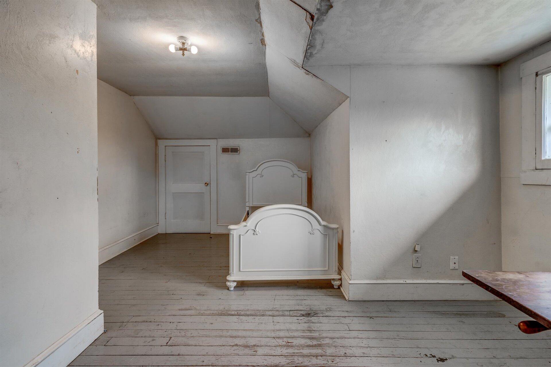 185 Tabernacle Road Penhook, VA 24137 - Photo 28 of 37 a view of empty room with wooden floor