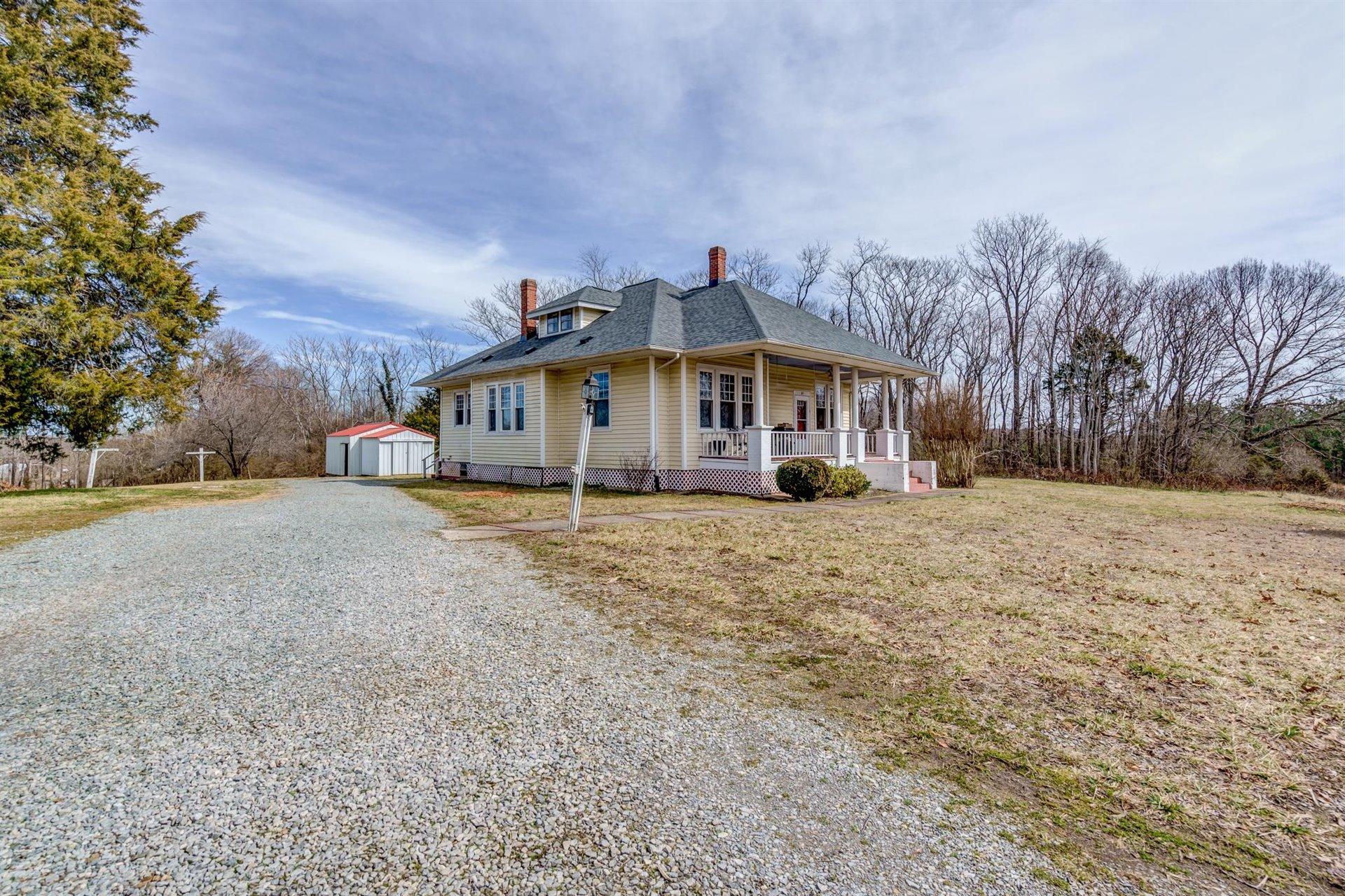 185 Tabernacle Road Penhook, VA 24137 - Photo 4 of 37 a view of a house with a yard