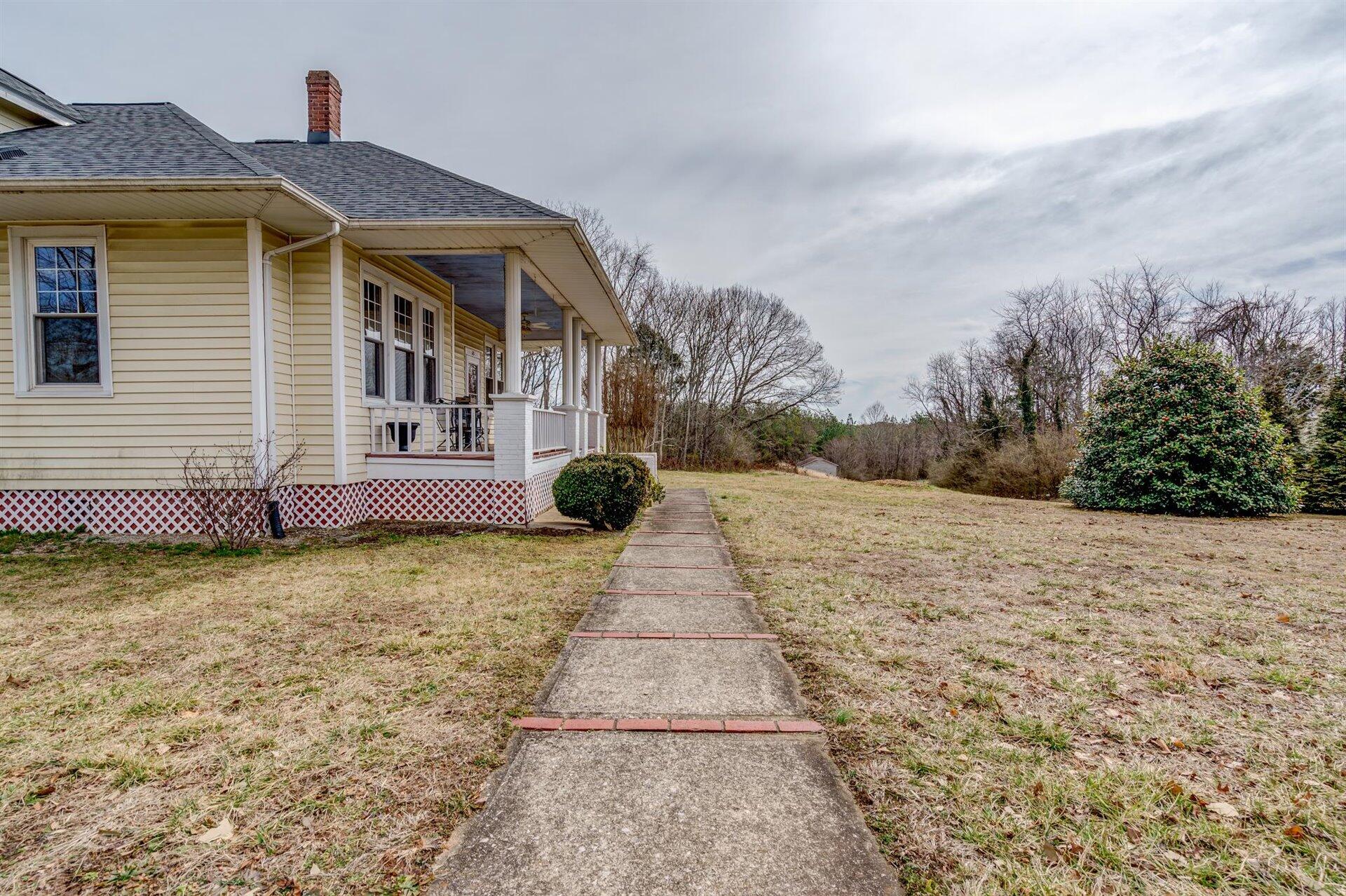 185 Tabernacle Road Penhook, VA 24137 - Photo 5 of 37 a view of a house with a yard