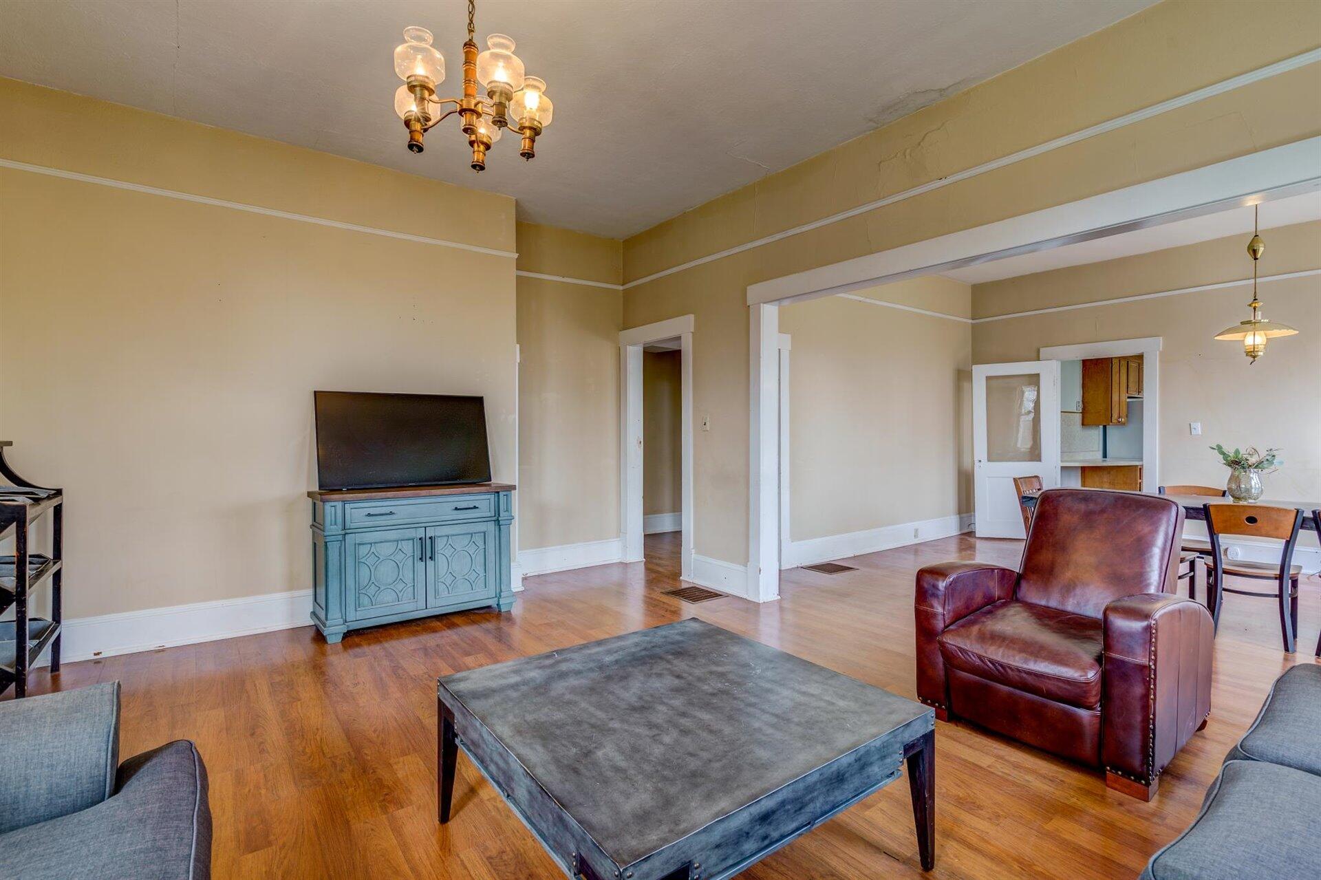 185 Tabernacle Road Penhook, VA 24137 - Photo 9 of 37 a living room with furniture and a flat screen tv