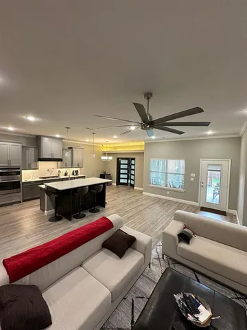 a kitchen with a stove and a table