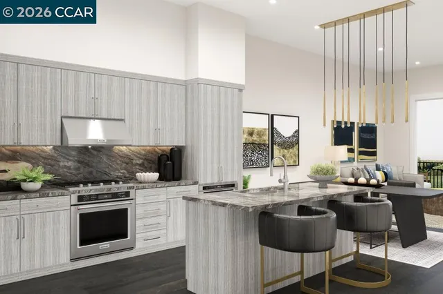 a kitchen with a stove a sink and a microwave