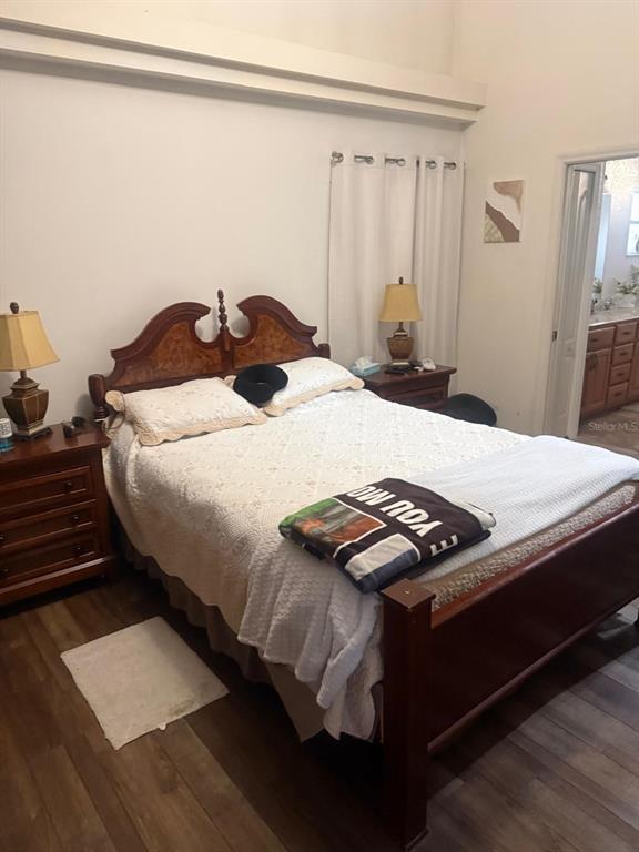 13055 Santee Street Spring Hill, FL 34609 - Photo 11 of 15 a bedroom with a bed and a dresser