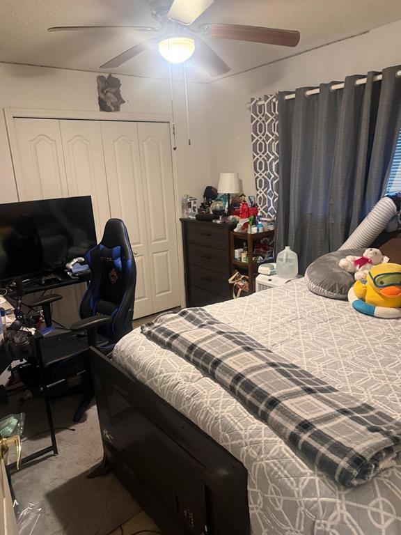 13055 Santee Street Spring Hill, FL 34609 - Photo 10 of 15 a bed room with a bed mirror and a desk