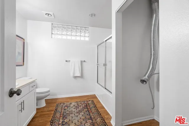 a bathroom with a sink and a toilet