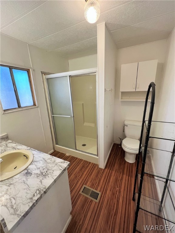 171 South Houck Road Golden Valley, AZ 86413 - Photo 11 of 36 a bathroom with a sink a toilet and shower